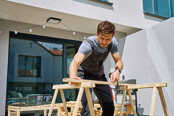 istock Carpenter measuring wooden board with tape measure 2223007817