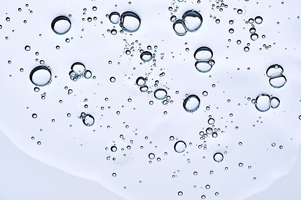 istock A drop of gel serum with bubbles. The texture. View from below. 2223013676