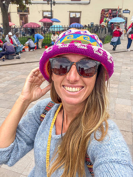 istock Smiling Woman Wearing Colorful Knitted Hat 2223016704