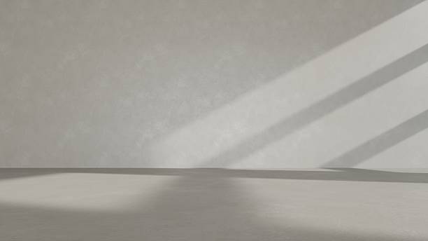istock Abstract of blank interior with sun light cast the shadow on the floor, Empty concrete wall backdrop, 3d rendering 2223018325