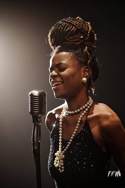 singer on a stage rock music concert musician performer holding microphone ready for karaoke