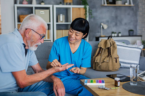 istock Nurse making sure that her senior patient is taking his medication on schedule 2223026942