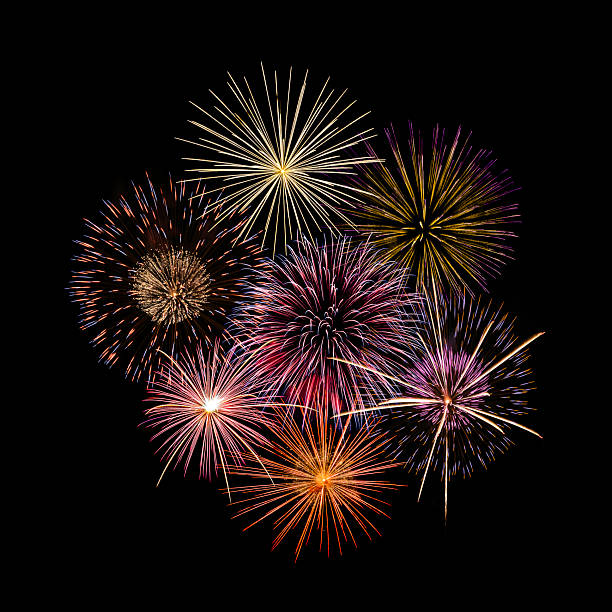 istock Fireworks of various colors and shapes burst in night sky 2223028541