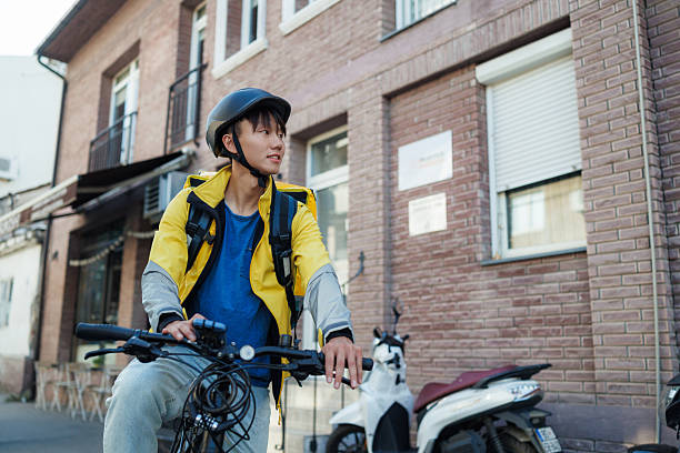 istock Young delivery man in action 2223030317