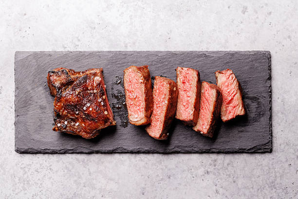 istock A perfectly cooked sliced striploin steak with a juicy, tender texture 2223033440