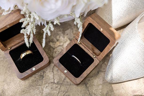 istock Wedding rings with bouquet and shoes. 2223035883
