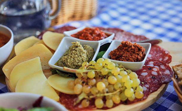 istock Charcuterie board with cheese and spreads. 2223037086