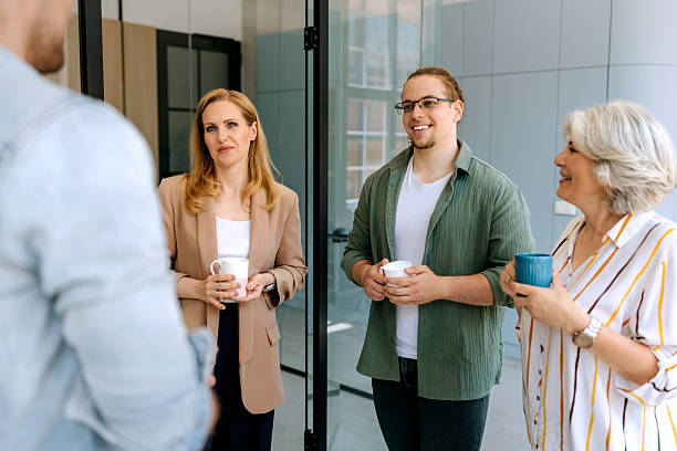 istock Business team in office having discussion during coffee break 2223041677
