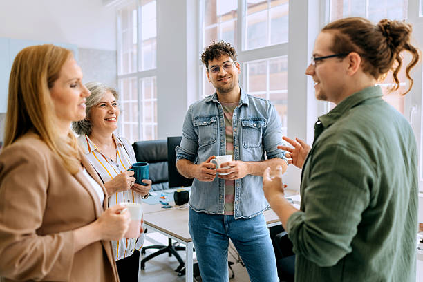 istock Business team in office having discussion during coffee break 2223041678