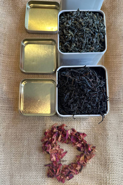 istock l jars filled with organic leaf tea, arranged on a burlap surface with decorative heart made of dried flowers 2223042353