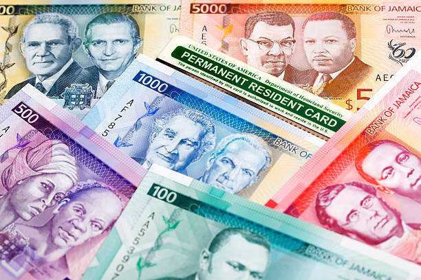 istock American permanent resident card on Jamaican dollar 2223042612