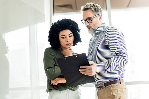 istock Professional teamwork of business colleagues collaborating on a project in a modern office space 2223043523