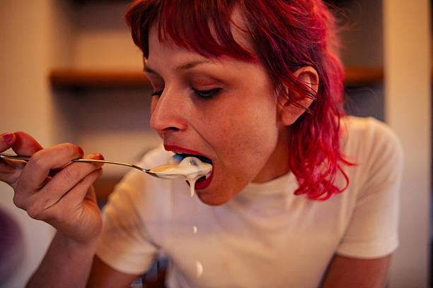 istock Woman Enjoying Blueberry Snacking Moments 2223046266