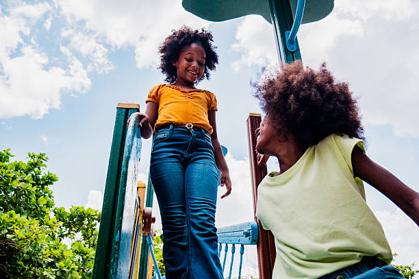 istock Child girls talking and playing on playground 2223047481