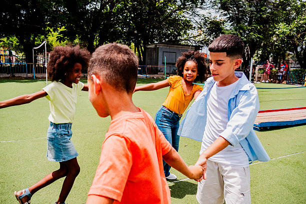 Child friends playing on public park