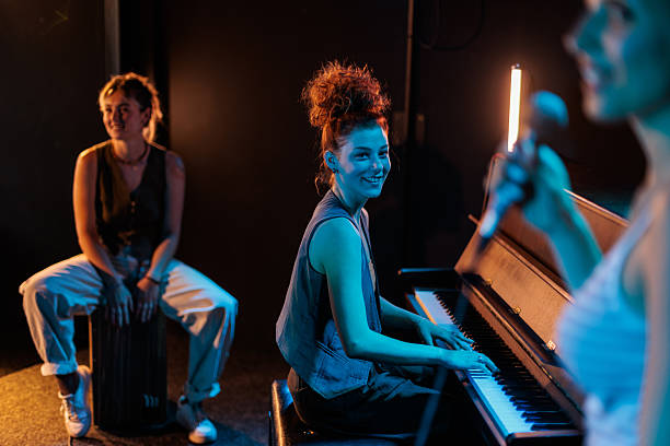 istock Smiling female band performing with joy 2223048819