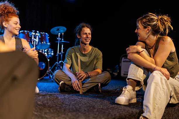 istock Bandmates sharing a laugh during rehearsal 2223050082