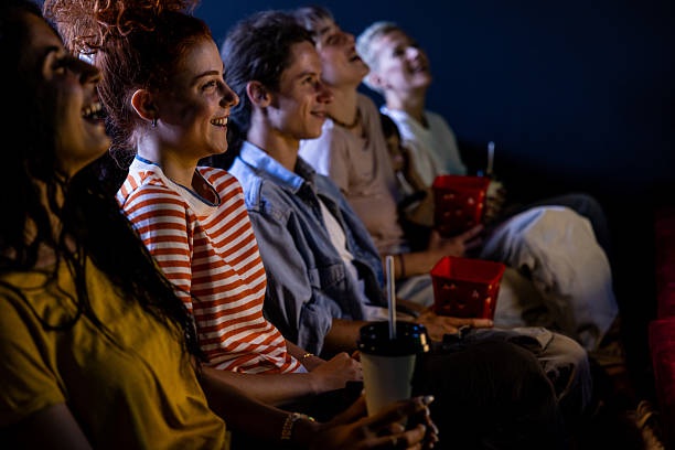 istock Smiling audience in cinema 2223052446