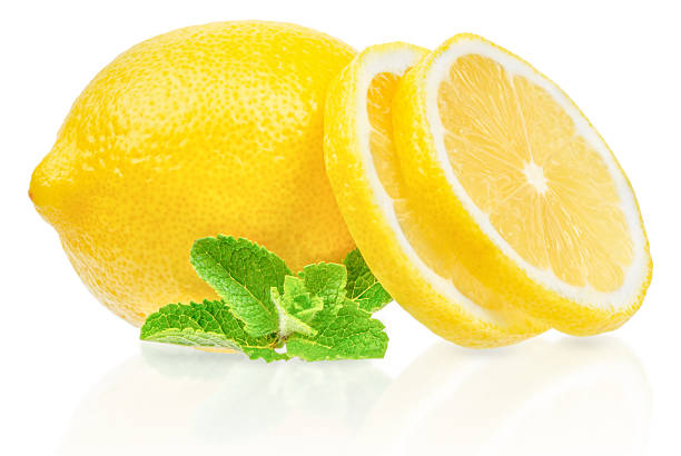istock A whole lemon with fresh slices and mint leaves arranged on a white background, symbolizing freshness, flavor, and natural ingredients 2223052763