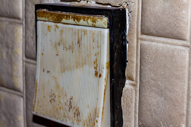 istock Dirty Old Light Switch on Wallpapered Wall — Vintage Interior, Burnt Plastic Switch, Neglected Home Electrical Detail 2223053724