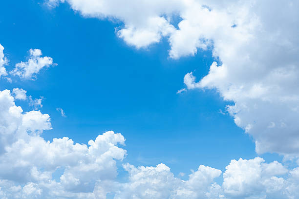 istock Vibrant Blue Sky with Fluffy White Cumulus Clouds Scenic Summer Daytime Atmosphere 2223055733