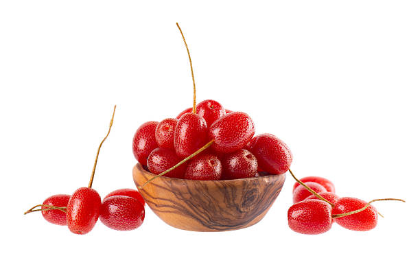 istock Elaeagnus multiflora isolated on white background. Cherry elaeagnus or cherry silverberry in wooden bowl. Goumi or gumi berry. 2223056710