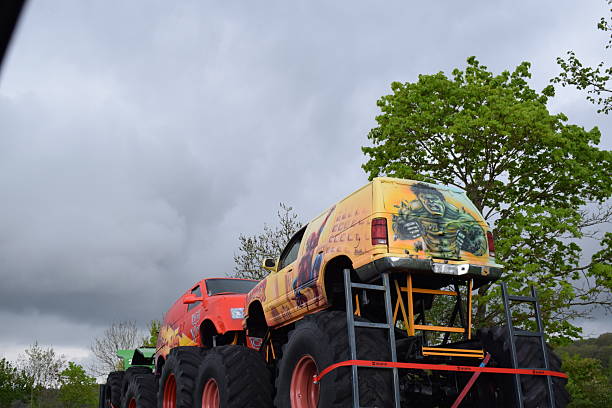 Eifel, Germany - April 24/2025: Monster trucks on a trailer
