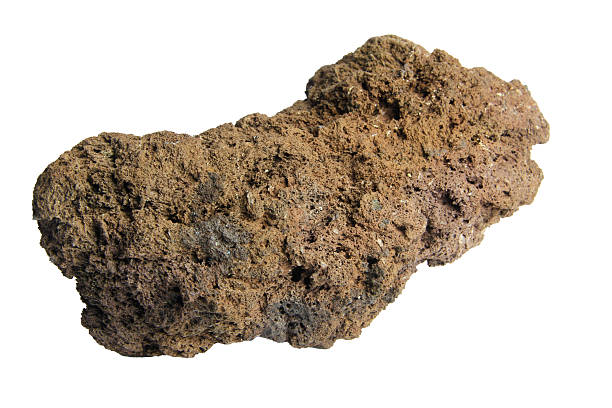 istock Volcanic lava rock with pitted surface and irregular shape isolated on a white background with clipping path 2223059100