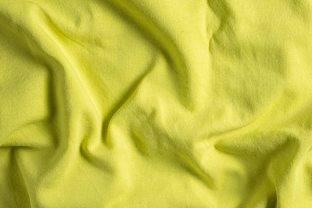 istock Close-Up of Abstract Yellow Cotton Textile Surface Top View 2223061391