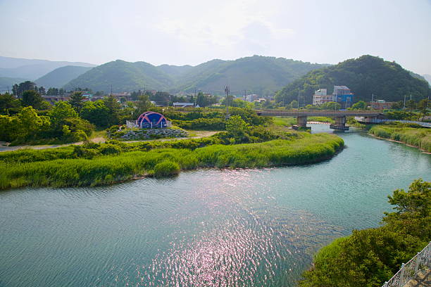 Jeongdongjin Stream with Mountain Backdrop