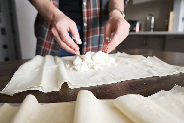istock Woman Preparing Blueberry Pastry with Phyllo Dough 2223068723