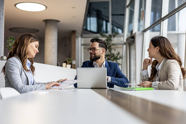istock Business team discussing financial results in modern office 2223069606