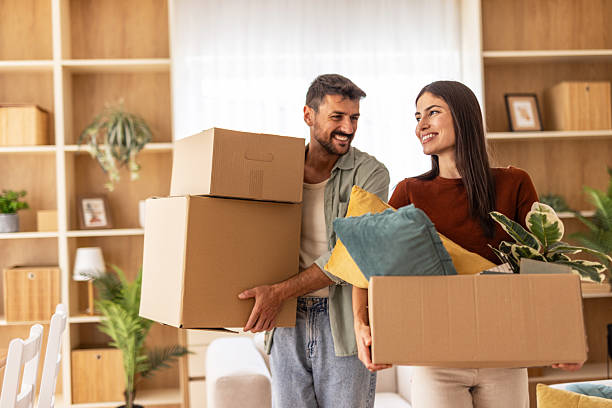 istock Happy couple moving into new home together 2223069839
