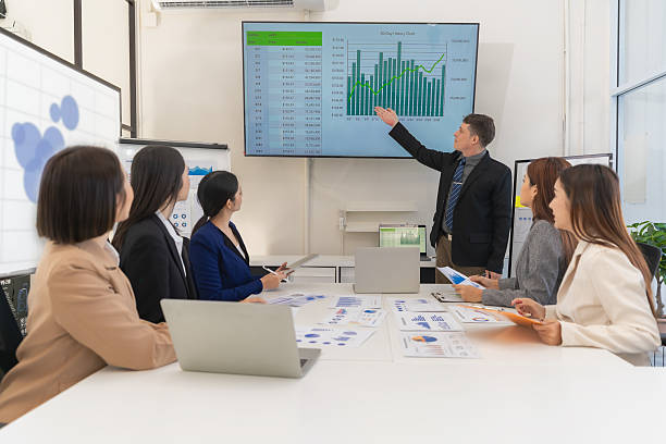 istock Teamwork is achieving greatness together, group of business colleagues having a brainstorming meeting in a new business startup meeting in a modern office. 2223070040