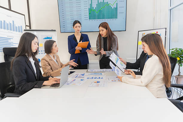 istock Teamwork is achieving greatness together, group of business colleagues having a brainstorming meeting in a new business startup meeting in a modern office. 2223070076