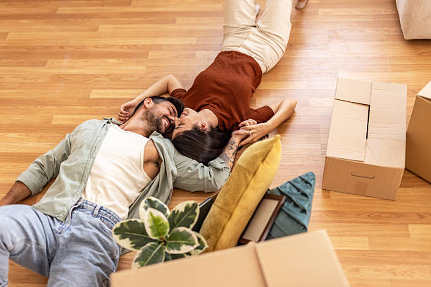 istock Young couple relaxing after moving day 2223070597
