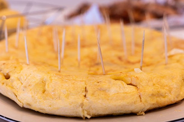 An omelet on the hob in preparation.