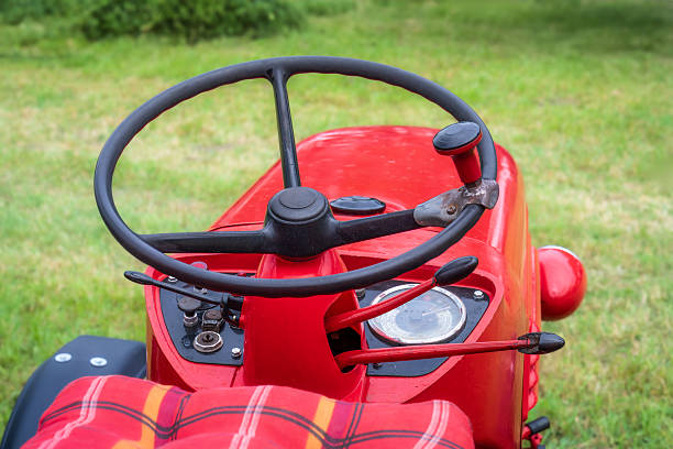 Steering wheel of an red old timer tractor