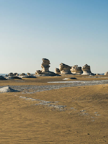 istock White rock formations and sand dunes in Egypt's White Desert, natural desert landscape 2223077608