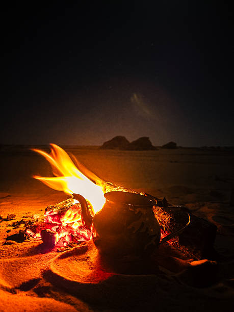 istock Campfire in the night camp in the White Desert in Egypt. Fire under the sky 2223077611