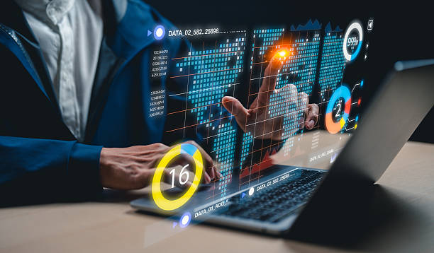 istock A businessman uses a laptop to access an AI-powered business analytics dashboard, showcasing charts. 2223080013