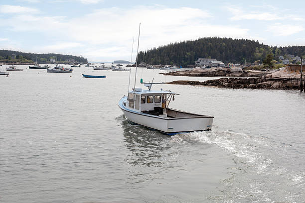 istock lobster boat moving in water 2223080372