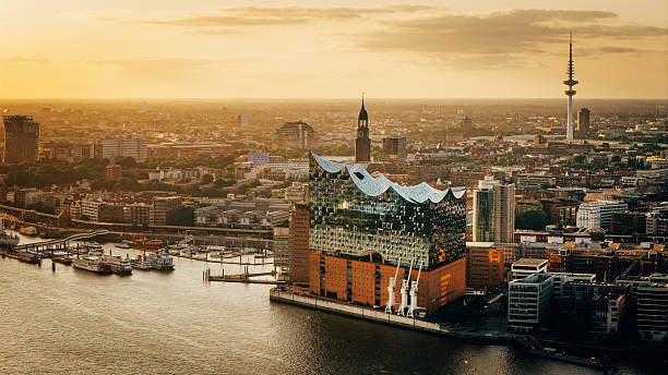 Aerial View of Hamburg's Elbphilharmonie During Sunset with City and River stock photo
