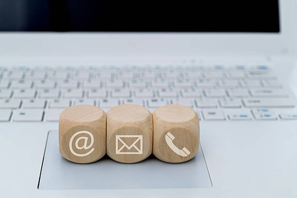 Contact us icons on laptop keyboard.