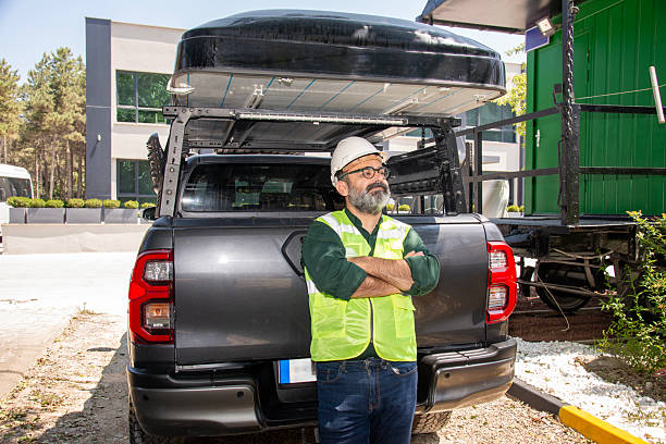 istock The engineer is waiting next to his car 2223085283