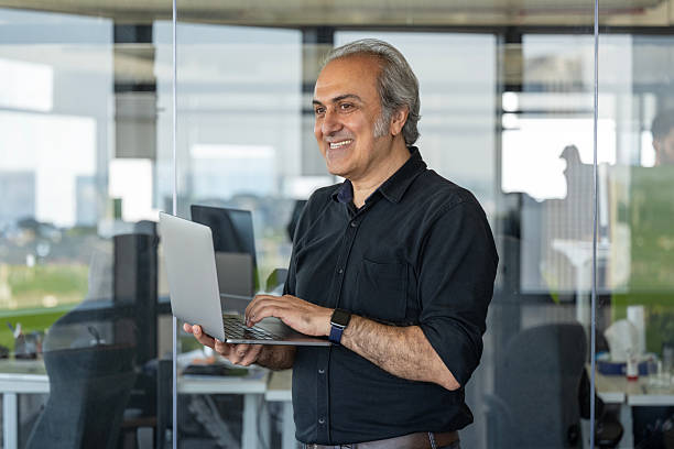 istock Senior Executive Working on Laptop in Office 2223086826