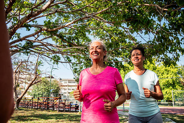 istock Senior women running on public park 2223102120
