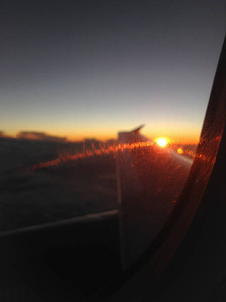 istock View of a sunset sky through an airplane window 2223108416