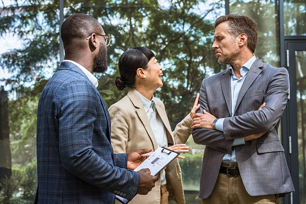 istock Multicultural business team having a discussion outdoor 2223109557