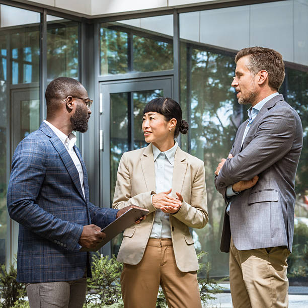 istock Multicultural business team having a discussion outdoor 2223110212